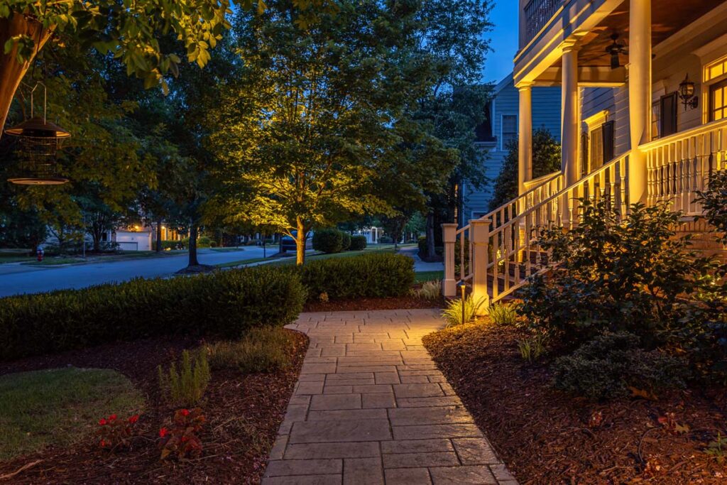 Side view of the Dominion entrance showing custom built walkways and low-voltage lighting.