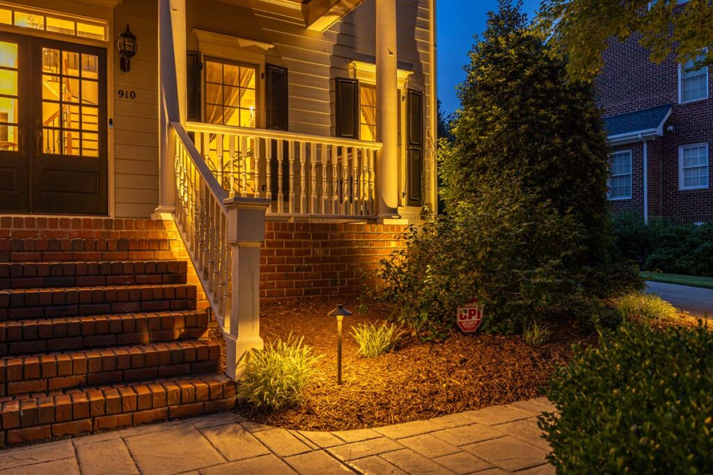 Close up of the Dominion entrance showing custom built walkways and low-voltage lighting.