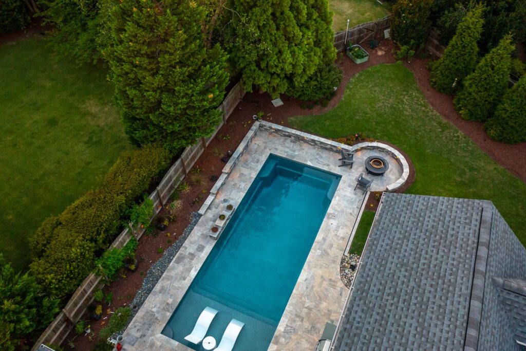 Aerial view of Dominion showing custom pool and fire pit.